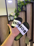 Sandalias BOSS negras con franja blanca y letras negras