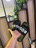 Sandalias BOSS negras con letras blancas
